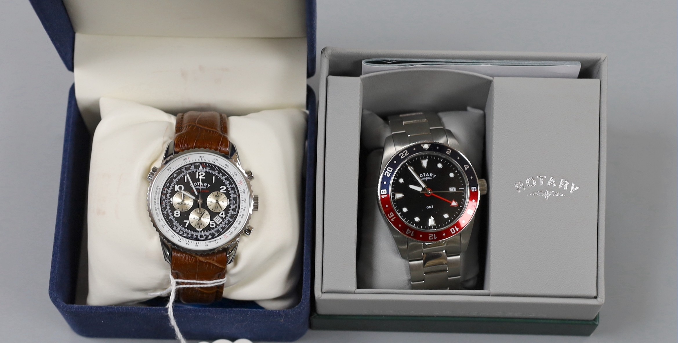 Two gentleman's modern stainless steel Rotary quartz wrist watches, model GMT and Chronospeed, both with boxes.